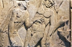 Relief: Ein Arzt behandelt einen Menschen